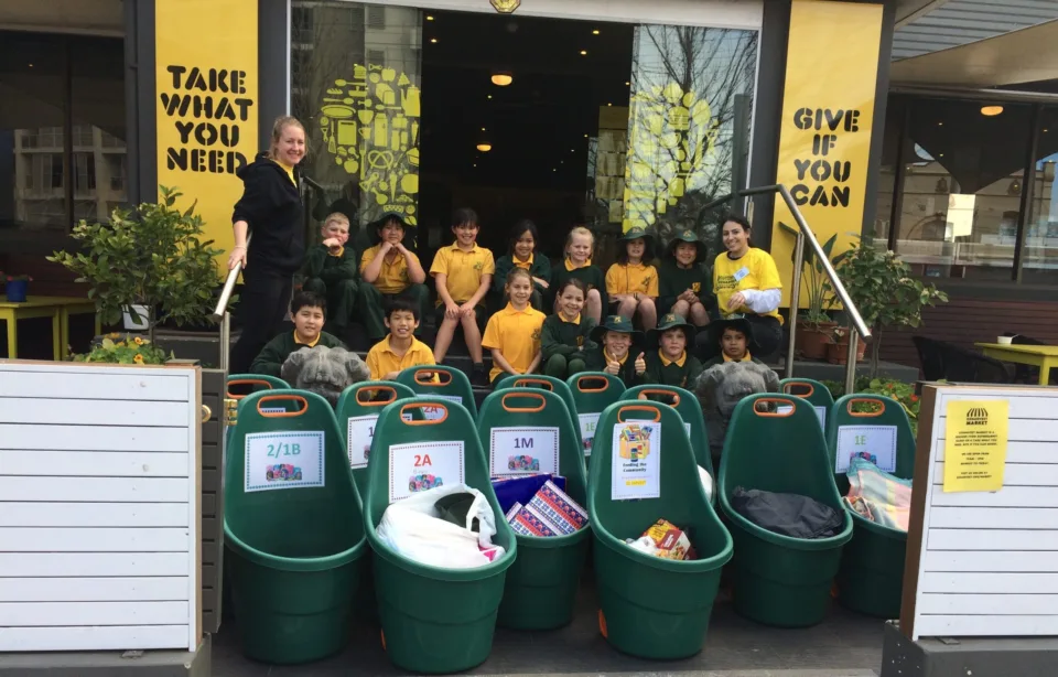 School children celebrating their fundraising efforts in support of OzHarvest.