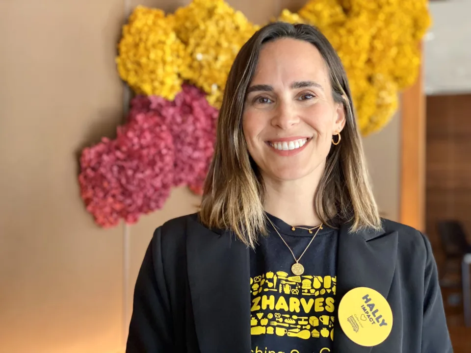 OzHarvest Head of Impact Hally Lara smiling.